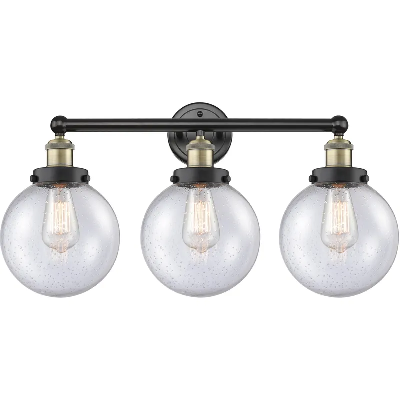 Beacon 3 Light 24.5 inch Black Antique Brass Bath Vanity Light Wall Light in Seedy