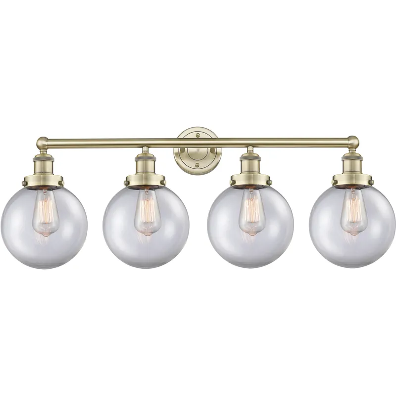 Beacon 4 Light 33.5 inch Antique Brass Bath Vanity Light Wall Light in Clear