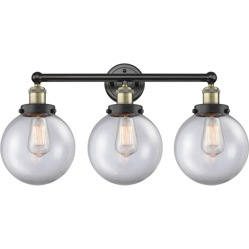 Beacon 3 Light 24.5 inch Black Antique Brass Bath Vanity Light Wall Light in Clear