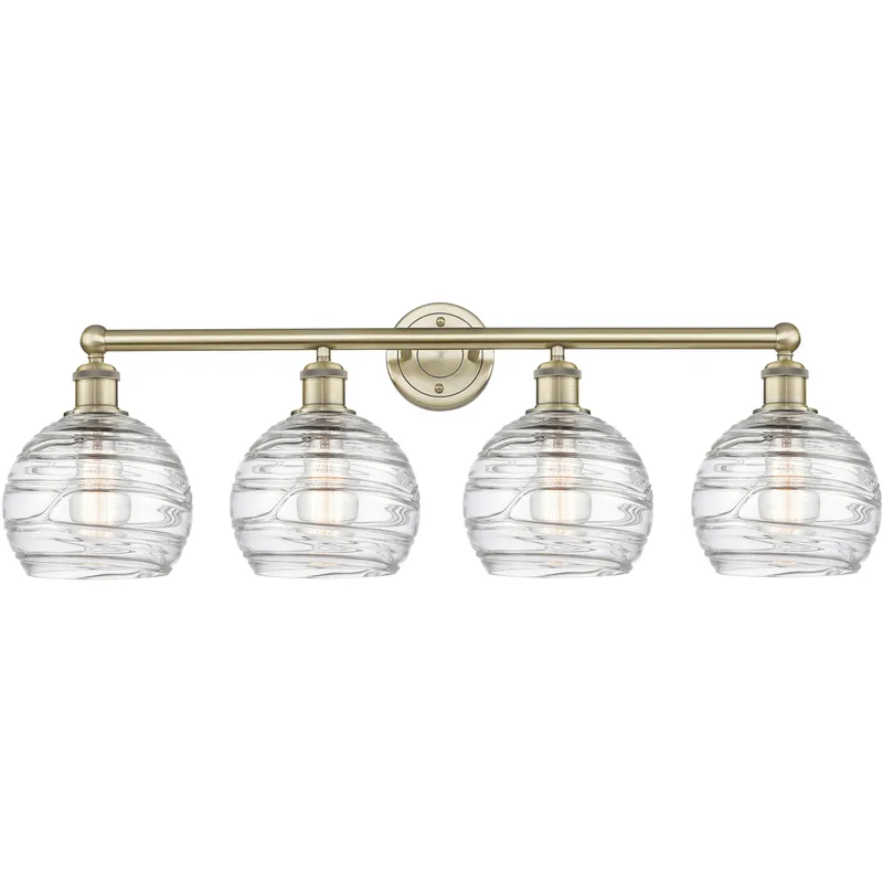 Athens Deco Swirl 4 Light 35 inch Antique Brass Bath Vanity Light Wall Light in Clear Deco Swirl Glass