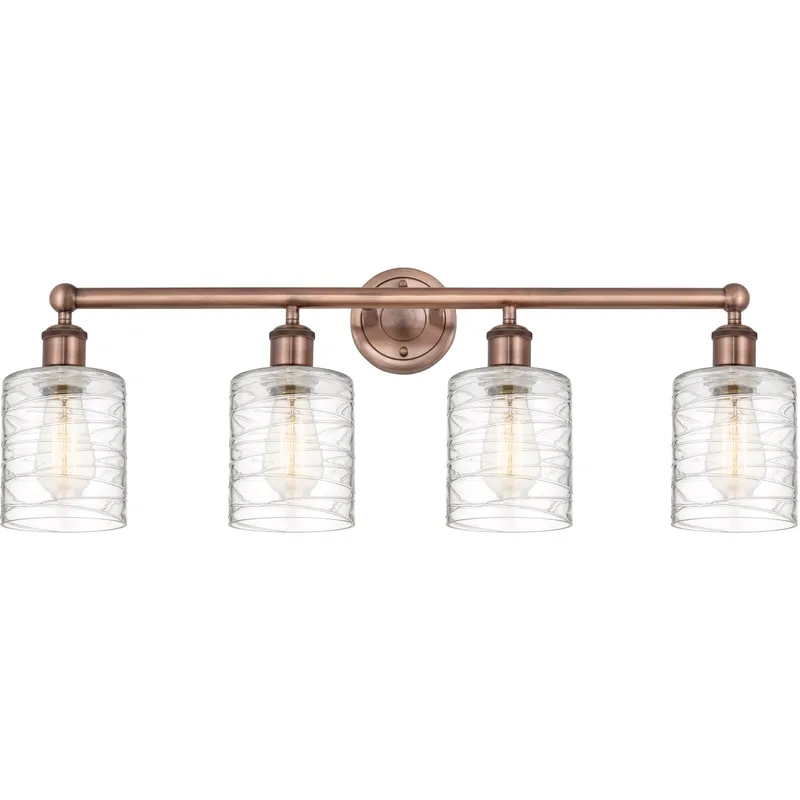Cobbleskill 4 Light 32 inch Antique Copper Bath Vanity Light Wall Light in Deco Swirl