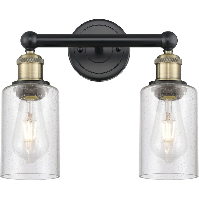 Clymer 2 Light 12.88 inch Black Antique Brass Bath Vanity Light Wall Light in Seedy Glass