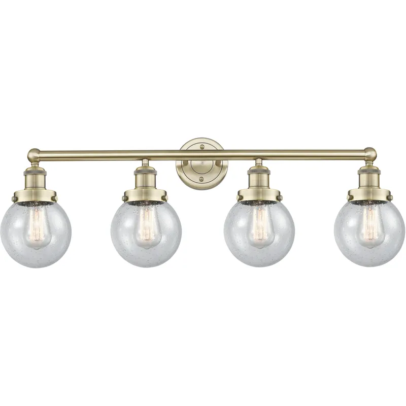 Beacon 4 Light 33.5 inch Antique Brass Bath Vanity Light Wall Light in Seedy