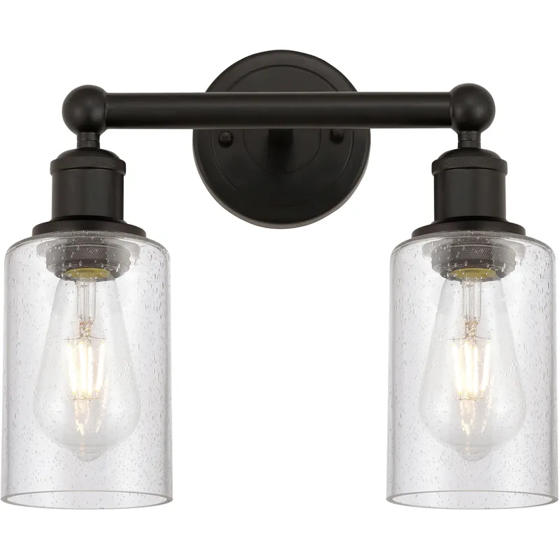 Clymer 2 Light 12.88 inch Oil Rubbed Bronze Bath Vanity Light Wall Light in Seedy Glass