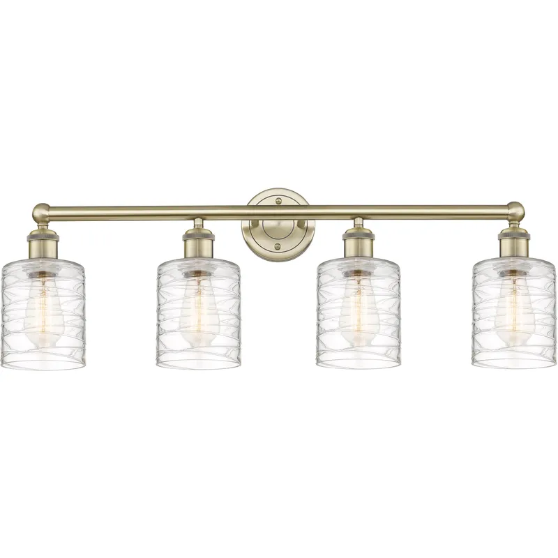 Cobbleskill 4 Light 32 inch Antique Brass Bath Vanity Light Wall Light in Deco Swirl