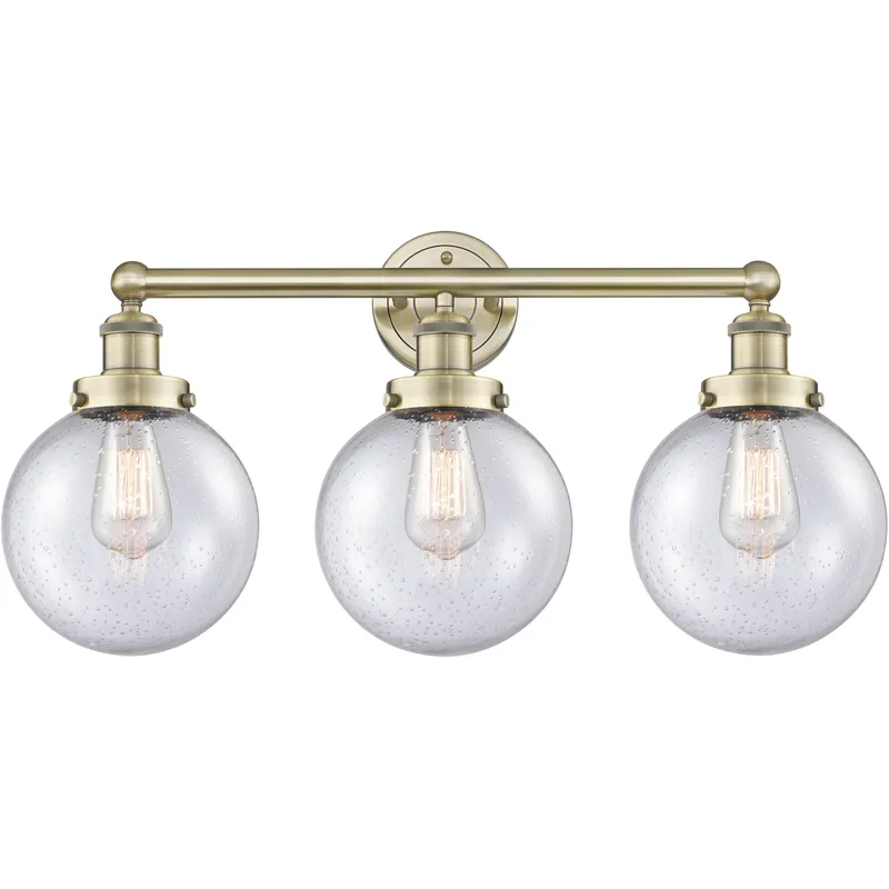 Beacon 3 Light 24.5 inch Antique Brass Bath Vanity Light Wall Light in Seedy