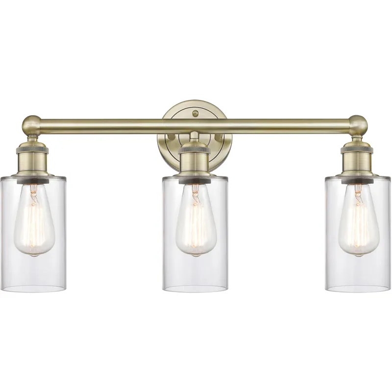 Clymer 3 Light 21.88 inch Antique Brass Bath Vanity Light Wall Light in Clear