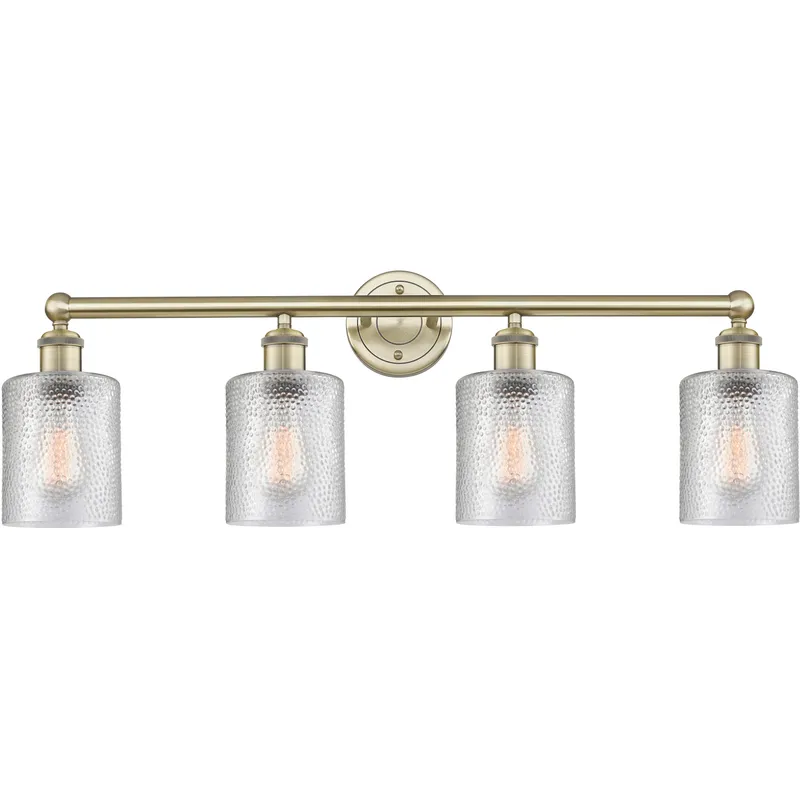 Cobbleskill 4 Light 32 inch Antique Brass Bath Vanity Light Wall Light in Clear