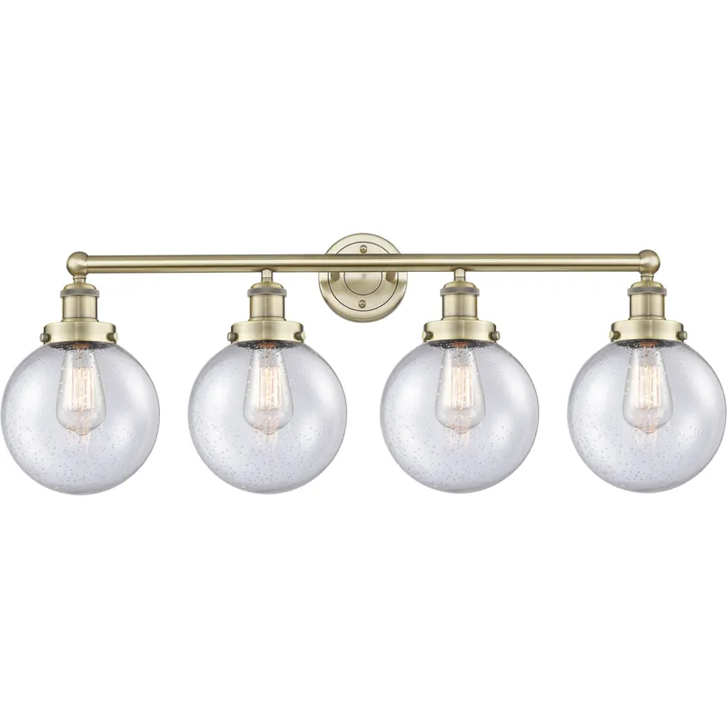 Beacon 4 Light 33.5 inch Antique Brass Bath Vanity Light Wall Light in Seedy