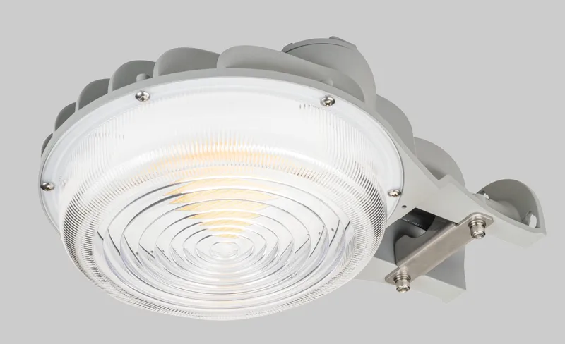 60W Dusk to Dawn LED Area Light feat. Power Select & Color Select. 60/40/30W, 120-277V Input, 3000/4000/5000K. Includes NEMA Type 3-pin Twist Lock Photocell, Type V Optics, 0-10V Dimmable. Standard Gray Housing