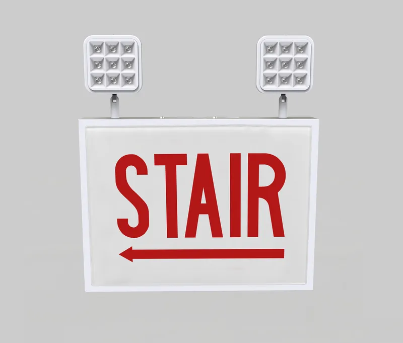Exit Combo | Steel | Chicago Compliant | Style 1 | White Color | Single Facing | Red Lettering | 6500K Dual Heads | Surface Mount | 120-277 Vac Input | Emergency Battery Backup | High Lumen Output | Additional Faceplate Included: STAIR LEFT ARROW