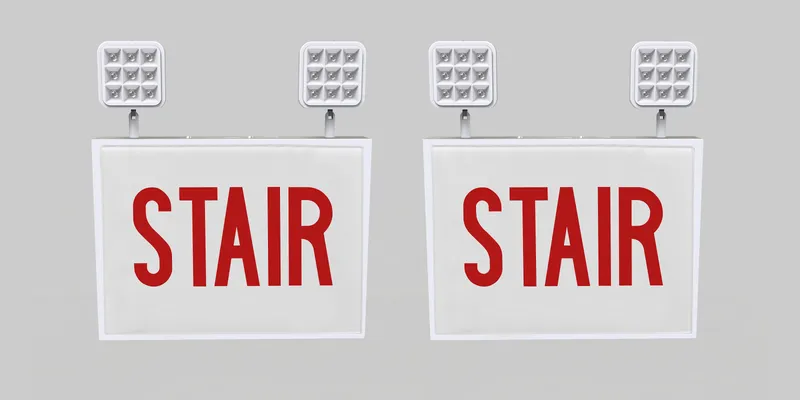 Exit Combo | Steel | Chicago Compliant | Style 1 | White Color | Single Facing | Red Lettering | 6500K Dual Heads | Surface Mount | 120-277 Vac Input | Emergency Battery Backup | High Lumen Output | Additional Faceplates Included: STAIR x2