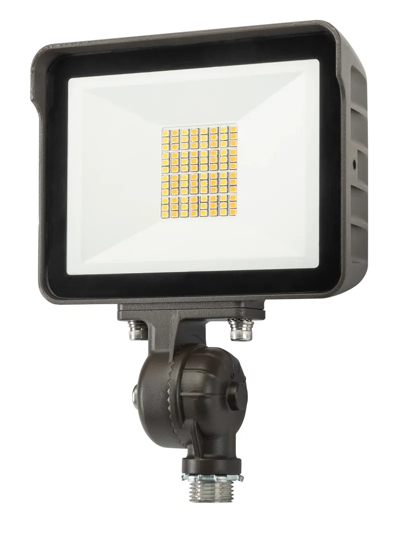 15W LED Flood Light feat. Color Select, Rectangular Series 1 with built in photocell. 120-277V Input, 3000K/4000K/5000K. Standard Bronze Housing. Wide Beam Spread, Universal Mount (1/2in Knuckle Mount with Yoke Mount option included) Dimmable. TAA compl