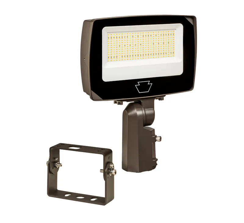 75/60/45W LED Flood Light feat. Power Select & Color Select. Rectangular Series 4 with Built-in Photocell. 120-277V Input. 3000/4000/5000K. Standard Bronze Housing. Wide Flood, 7H x 7W Distribution. Slip Fitter and Trunnion Mounts Included.