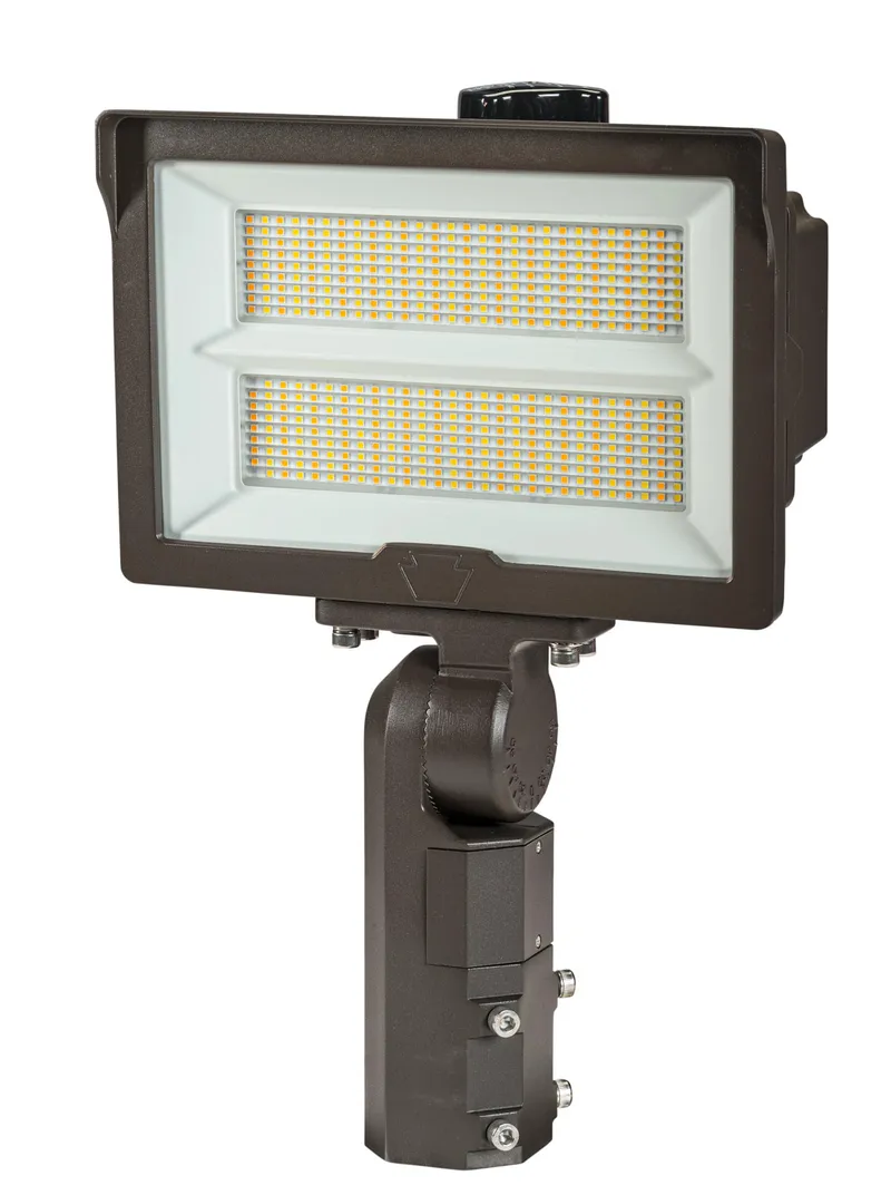 290W LED Flood Light feat. Power Select, Color Select. Rectangular Series 2 with Built-in Photocell. 277-480V Input, 3000K/4000K/5000K. Standard Bronze Housing. 7H x 6V Distribution, Slip Fitter and Trunnion Mount Included. TAA Compliant