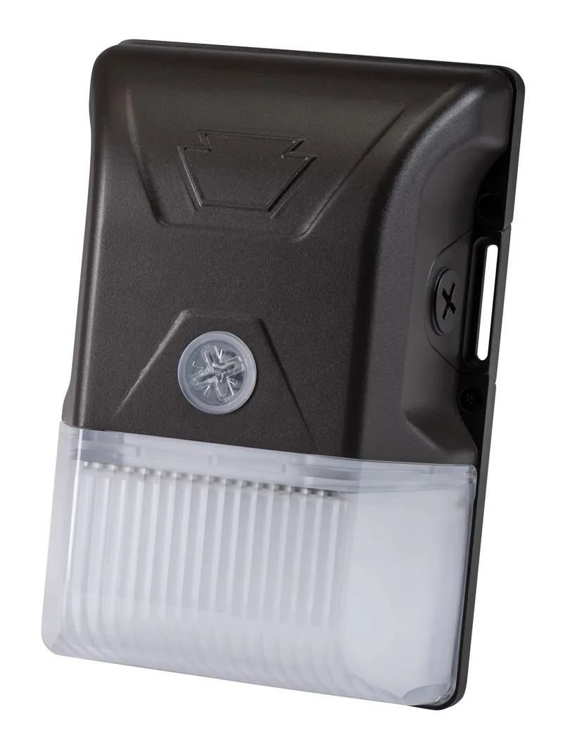 20W LED Wall Pack feat Color Select, Small/Entryway Style Housing, Series 1 with built in photocell. 120-277V Input, 3000K/4000K/5000K. Standard Bronze Housing. Dimmable. TAA compliant